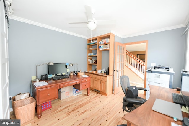 office with light hardwood / wood-style floors, french doors, ornamental molding, and ceiling fan