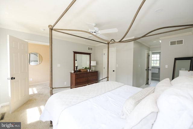 bedroom with ceiling fan, light colored carpet, and ornamental molding