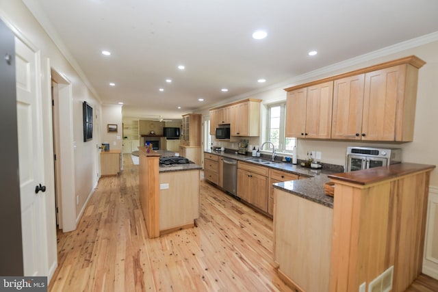 kitchen with light brown cabinets, light hardwood / wood-style floors, kitchen peninsula, stainless steel dishwasher, and crown molding