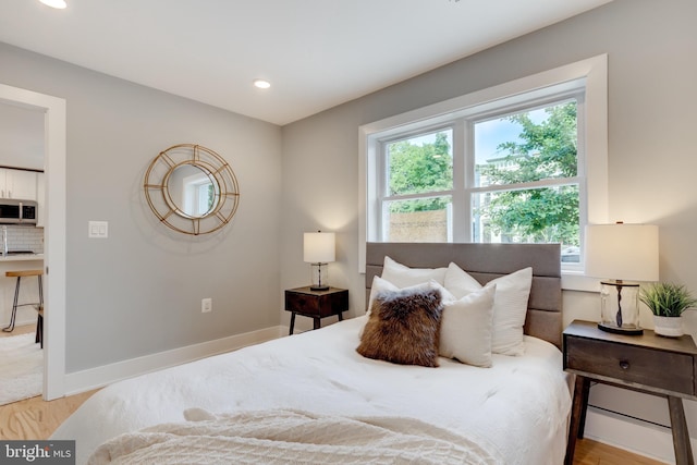 bedroom featuring light wood-type flooring