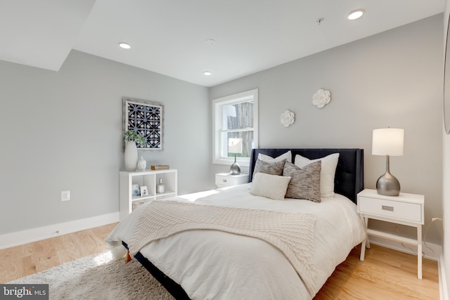 bedroom featuring light hardwood / wood-style floors