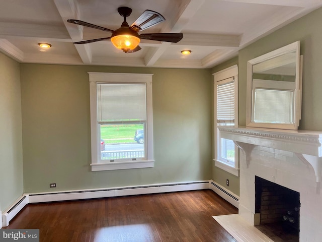 unfurnished living room with a brick fireplace, coffered ceiling, ceiling fan, a baseboard heating unit, and beamed ceiling