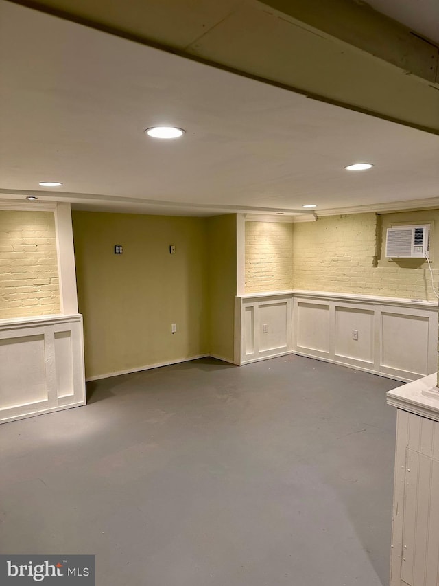 basement featuring an AC wall unit