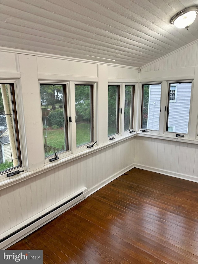 unfurnished sunroom with baseboard heating, wooden ceiling, and vaulted ceiling