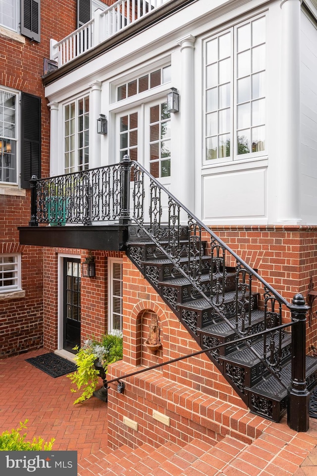 property entrance with a balcony