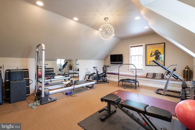 exercise area with carpet flooring and lofted ceiling