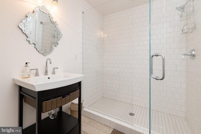 bathroom with sink and walk in shower