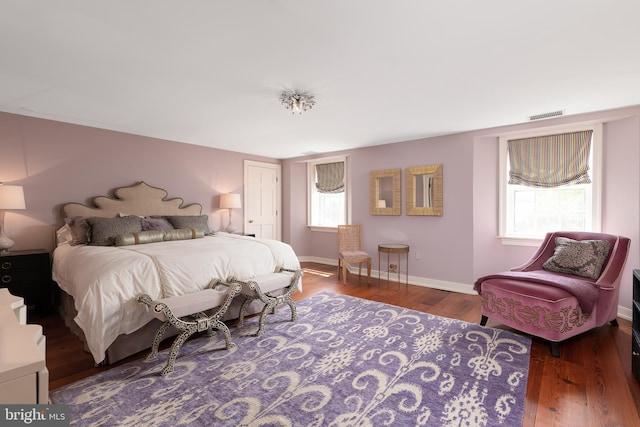 bedroom featuring dark wood-type flooring