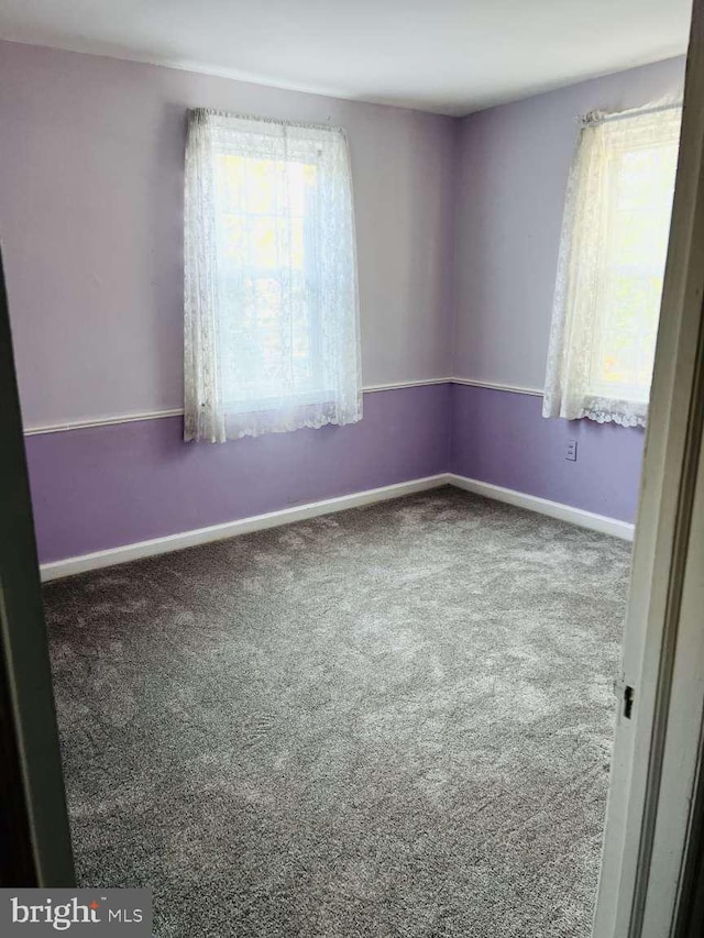 view of carpeted spare room