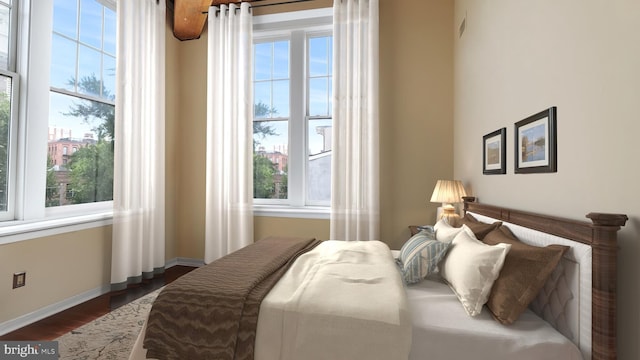 bedroom featuring dark wood-type flooring