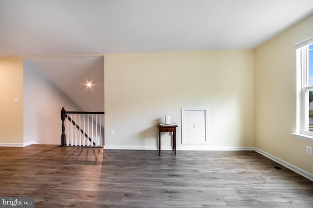 spare room featuring hardwood / wood-style floors