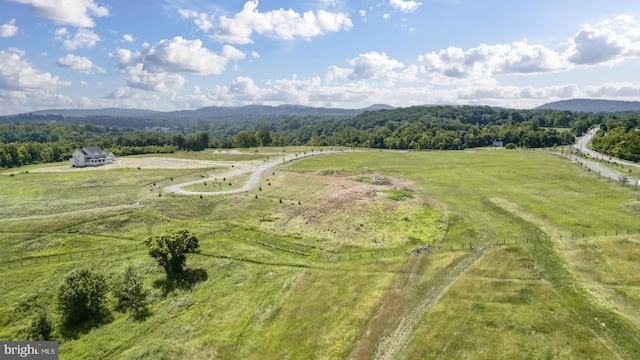 bird's eye view with a mountain view and a rural view