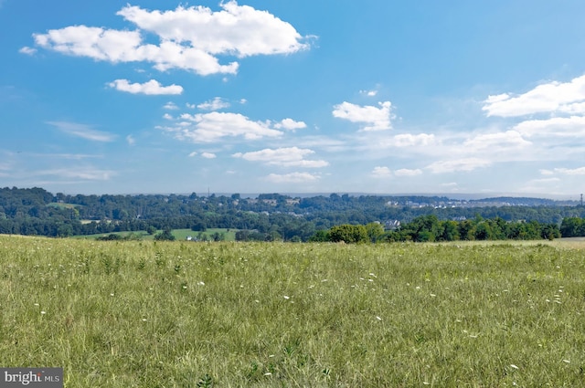 view of mountain feature featuring a rural view