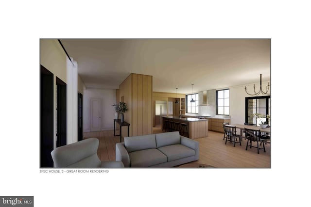 living room featuring an inviting chandelier and light hardwood / wood-style floors