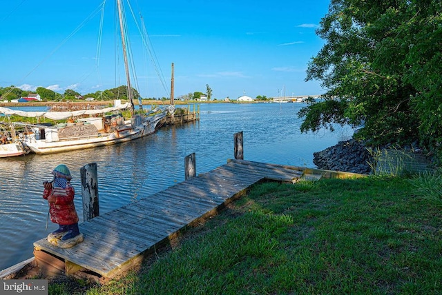 view of dock with a water view