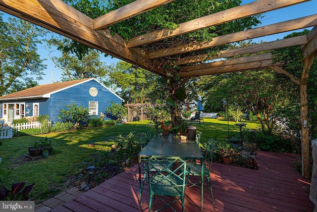 deck with a yard and a pergola