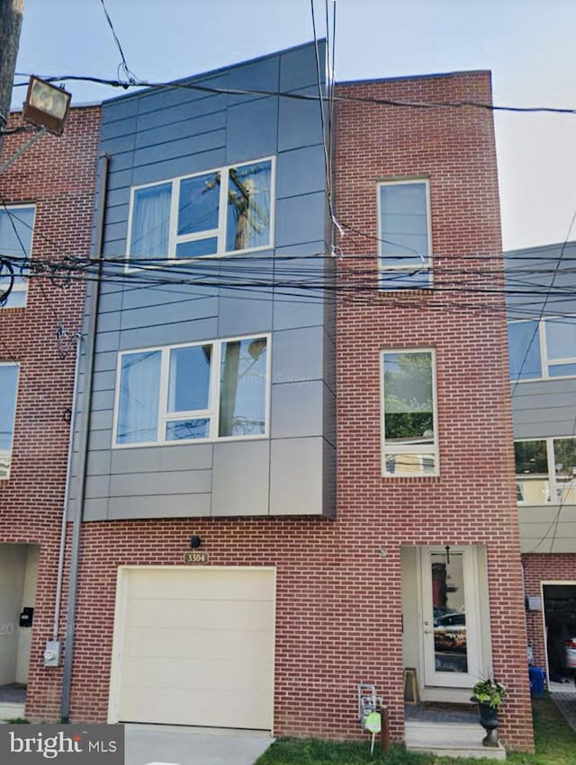 view of property featuring a garage