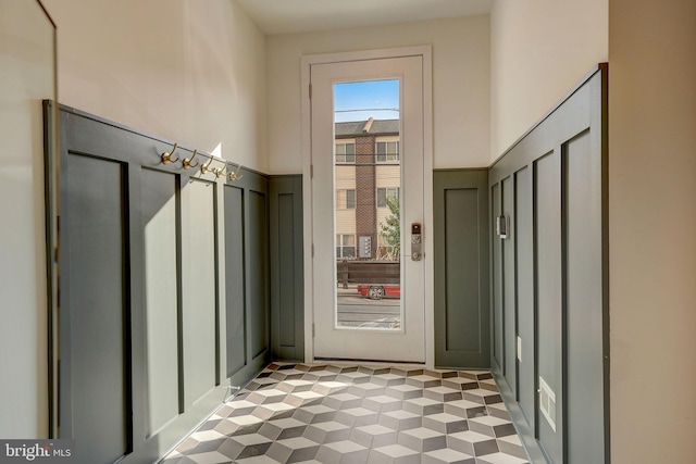 doorway to outside featuring light floors