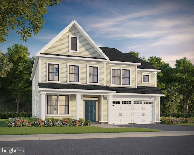 view of front of home with a garage