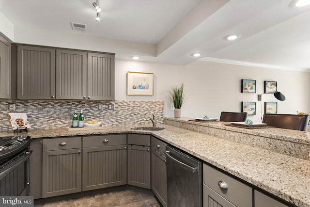 kitchen featuring light stone countertops, appliances with stainless steel finishes, sink, and gray cabinetry