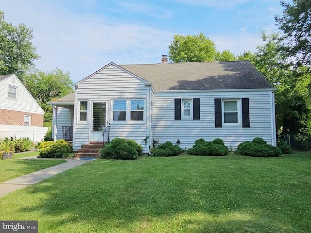 view of front of property with a front lawn