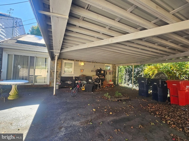 view of patio / terrace with a carport