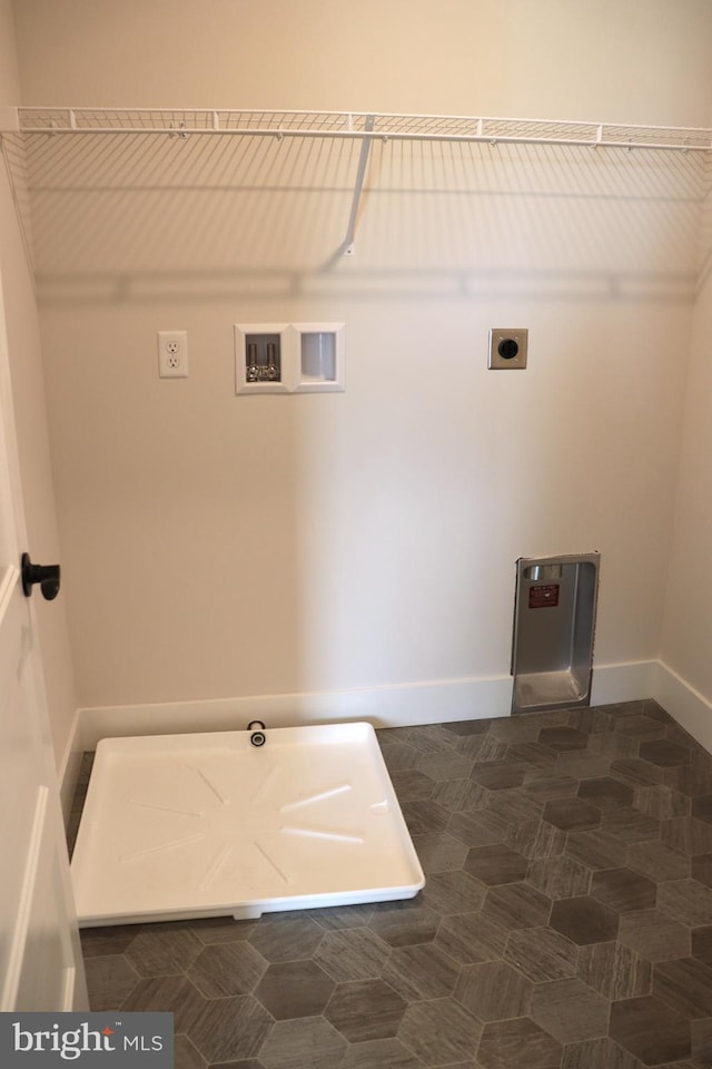 laundry area with hookup for an electric dryer and hookup for a washing machine