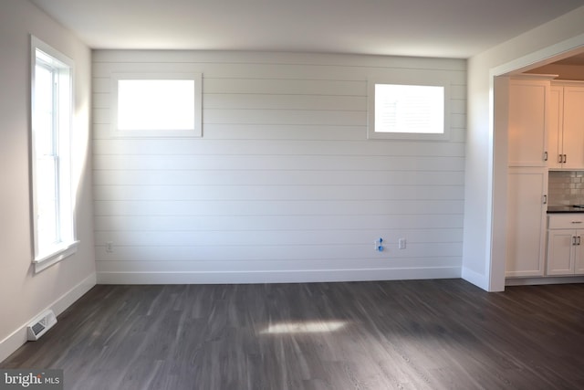 interior space featuring dark wood-type flooring