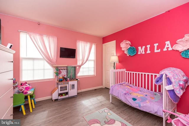 bedroom featuring hardwood / wood-style floors