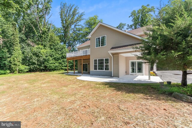 rear view of property with a patio area