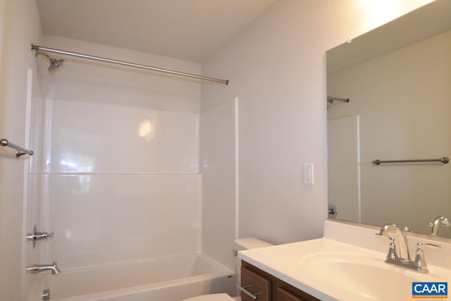 full bathroom with vanity, washtub / shower combination, and toilet