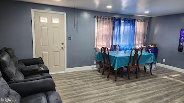 dining room with hardwood / wood-style floors