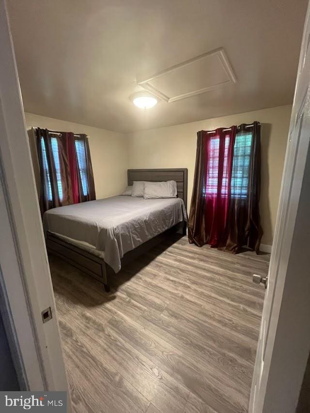 bedroom featuring hardwood / wood-style floors