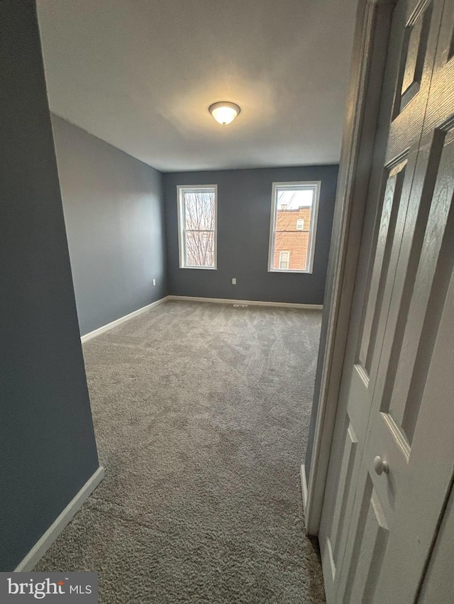 view of carpeted spare room