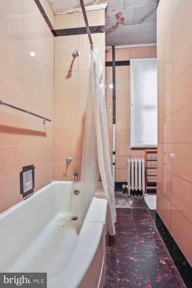 bathroom with radiator heating unit and shower / bathtub combination with curtain