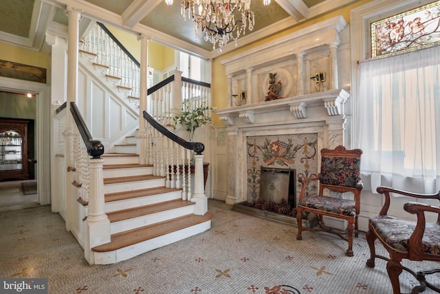 staircase featuring coffered ceiling, a high ceiling, beamed ceiling, crown molding, and a fireplace