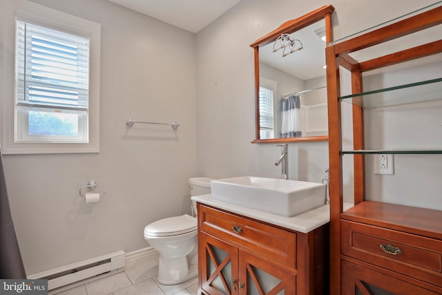 bathroom featuring baseboard heating, tile patterned flooring, toilet, vanity, and a shower with shower curtain