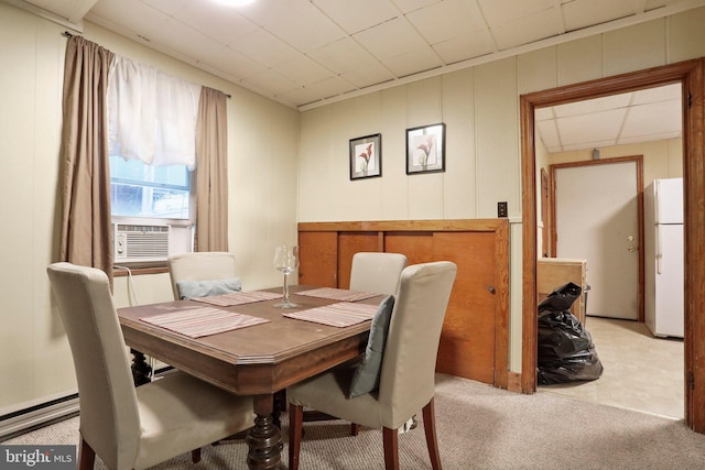 view of carpeted dining space