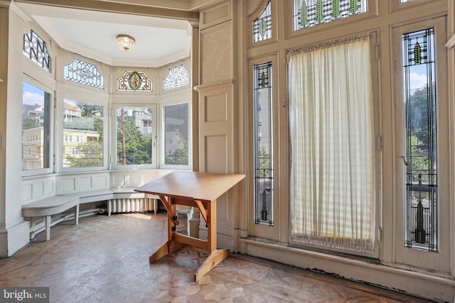 sunroom / solarium featuring a wealth of natural light