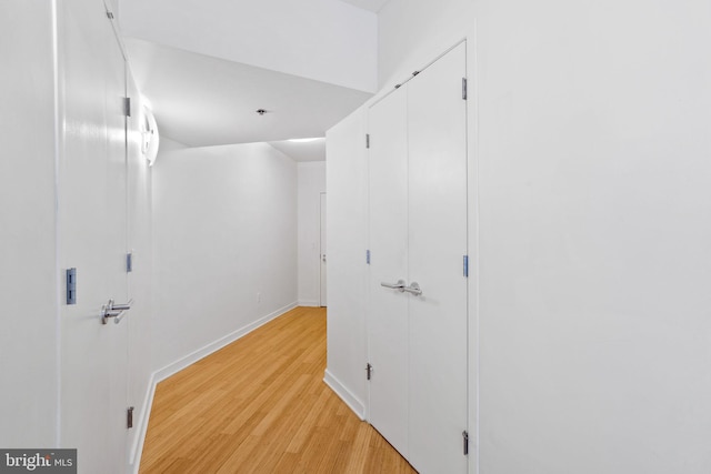 hallway featuring light wood-type flooring