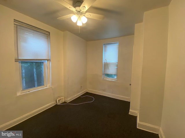 unfurnished room with ceiling fan