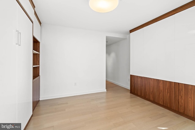 spare room with light hardwood / wood-style floors