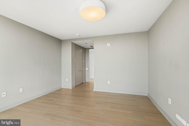 empty room with light wood-type flooring