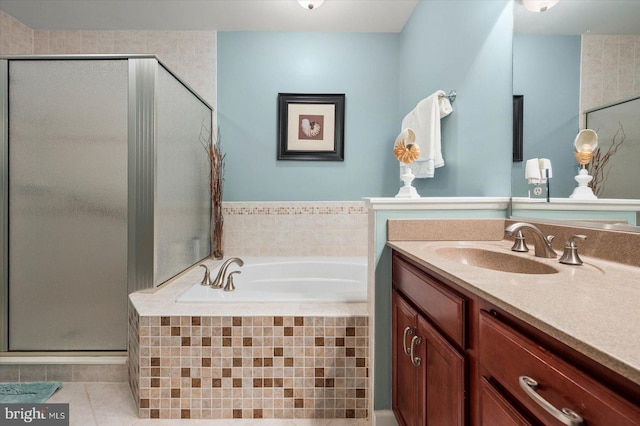 bathroom with tile patterned flooring, plus walk in shower, and vanity