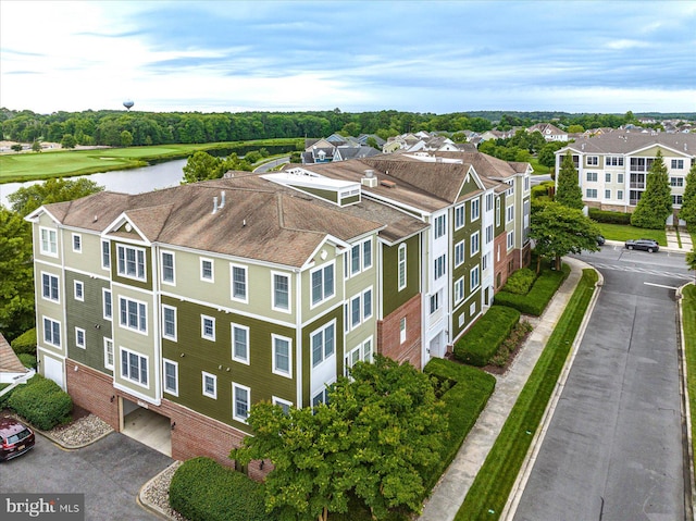 bird's eye view with a water view