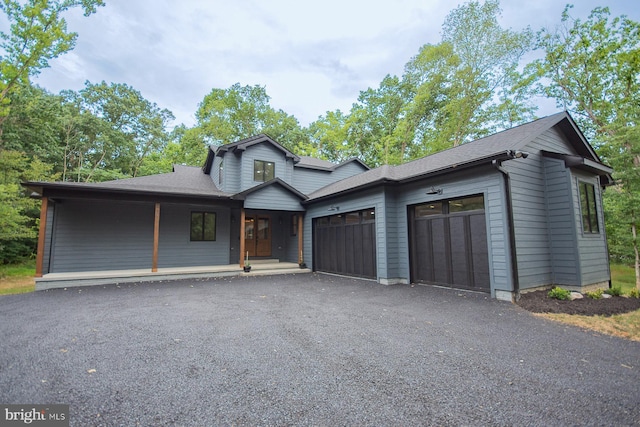 view of front of home featuring a garage and driveway