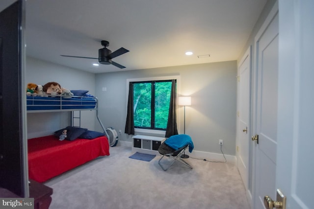 bedroom featuring a ceiling fan, baseboards, carpet flooring, and recessed lighting