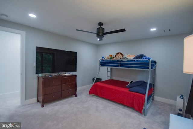 bedroom with light carpet, ceiling fan, baseboards, and recessed lighting