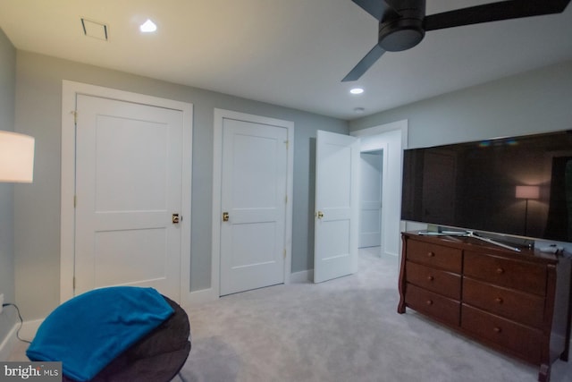 bedroom with recessed lighting, light colored carpet, ceiling fan, and baseboards