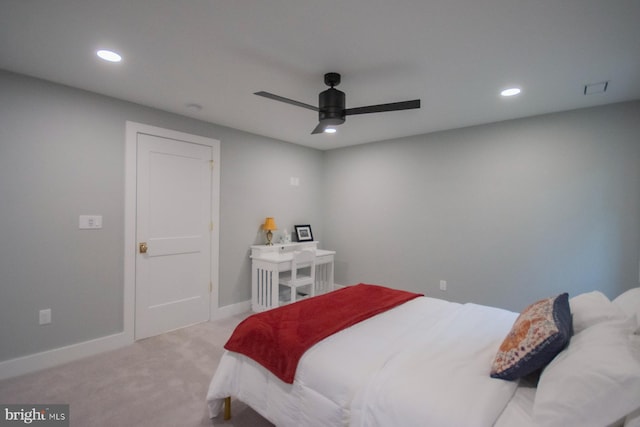 bedroom featuring recessed lighting, baseboards, ceiling fan, and light colored carpet